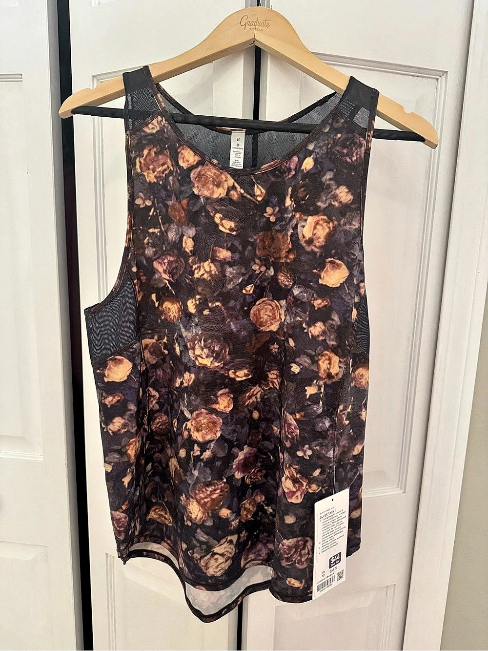 NWT. Lululemon Sculpt Tank II Floral Mesh Muscle Tank Black with floral print.